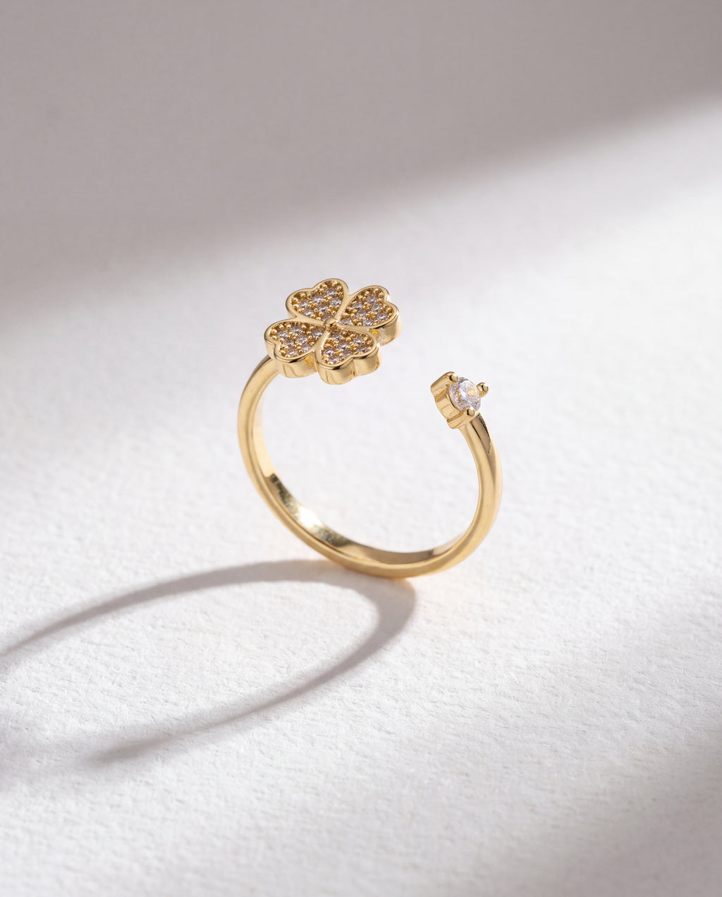 Clover Serenara Anxiety Ring standing upright on white textured watercolor paper