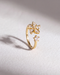 Golden Windmill Serenara Anxiety Ring standing upright on white textured watercolor paper
