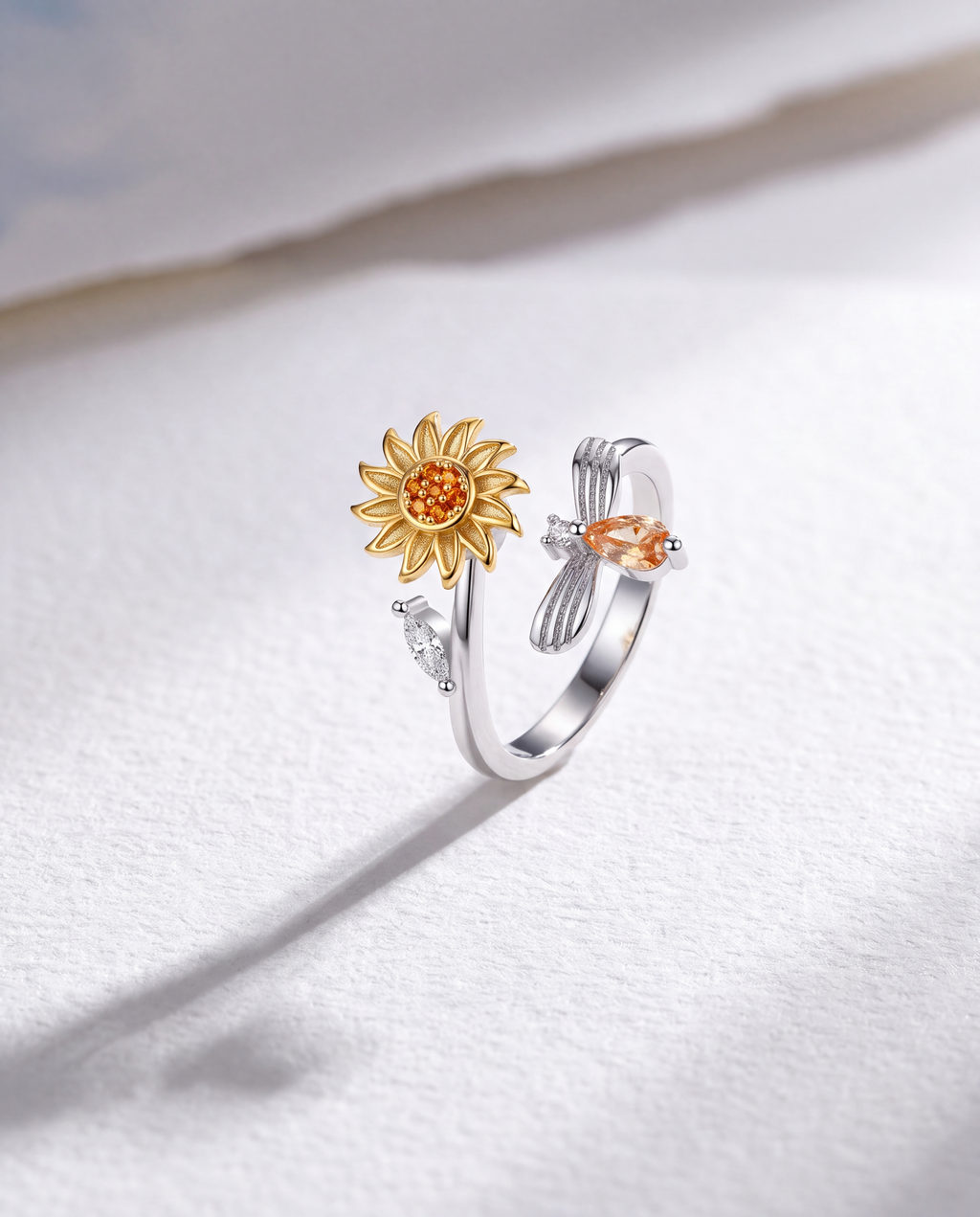 Sunflower and Bee Serenara Anxiety Ring standing upright on white textured watercolor paper