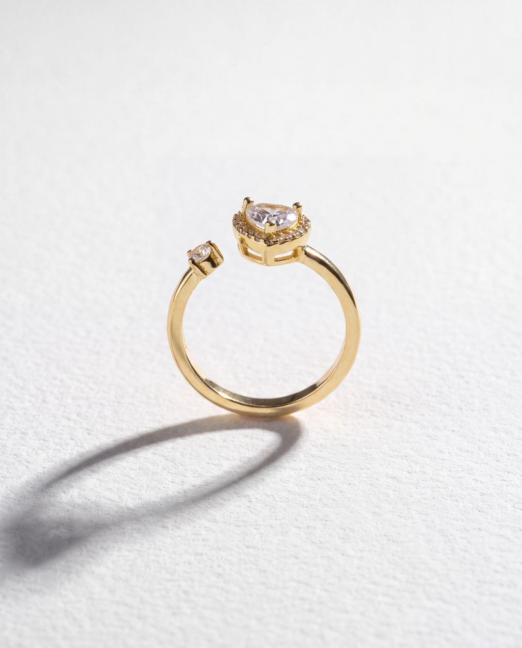 Heart Zircon Serenara Anxiety Ring standing upright on white textured watercolor paper