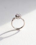 Basic Micro-inlaid Serenara Anxiety Ring standing upright on white textured watercolor paper, soft shadow