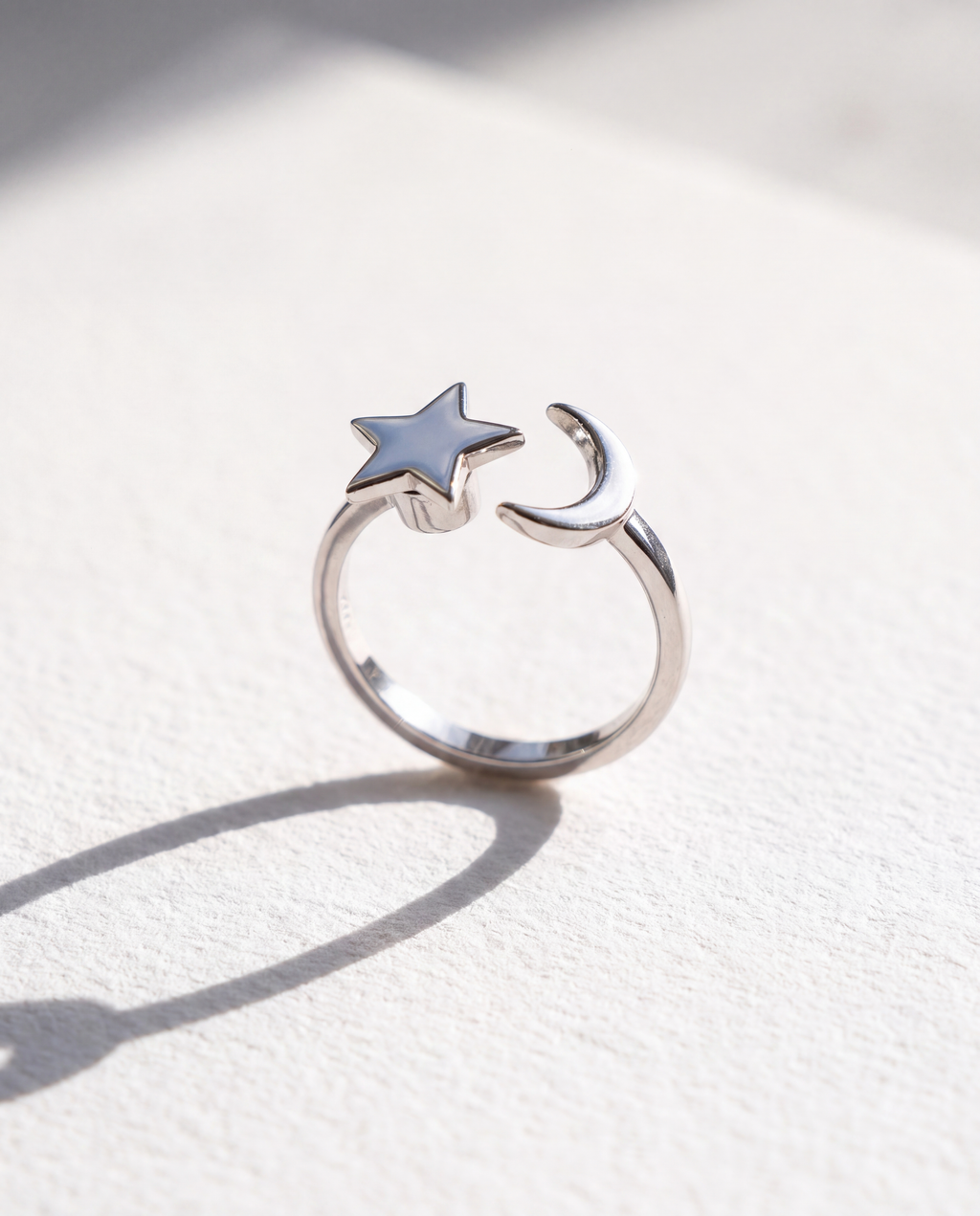 Sun and Moon Serenara Anxiety Ring standing upright on white textured watercolor paper