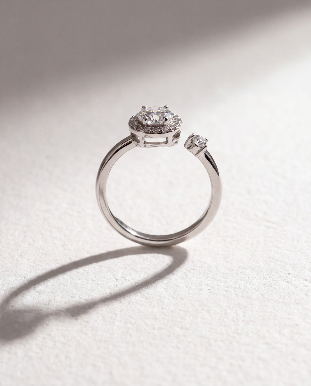 Basic Micro-inlaid Serenara Anxiety Ring standing upright on white textured watercolor paper